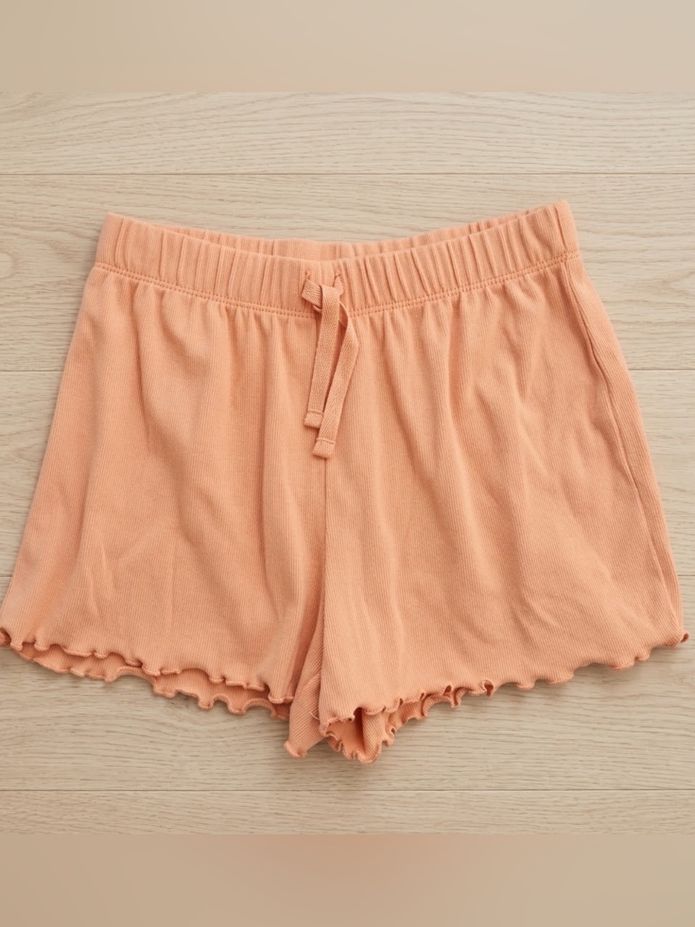 Kids' Orange Ruffle Hem Shorts
